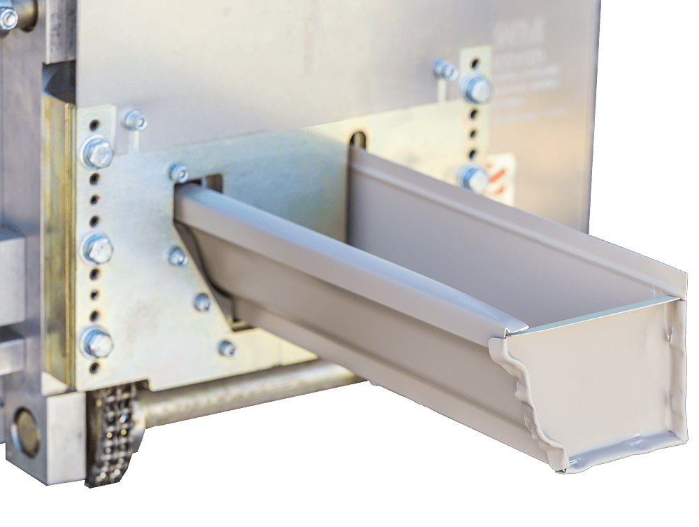 Seamless gutter emerging from the on site forming machine